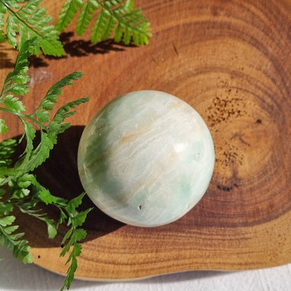 Caribbean Calcite Sphere - Pakistan - 215g