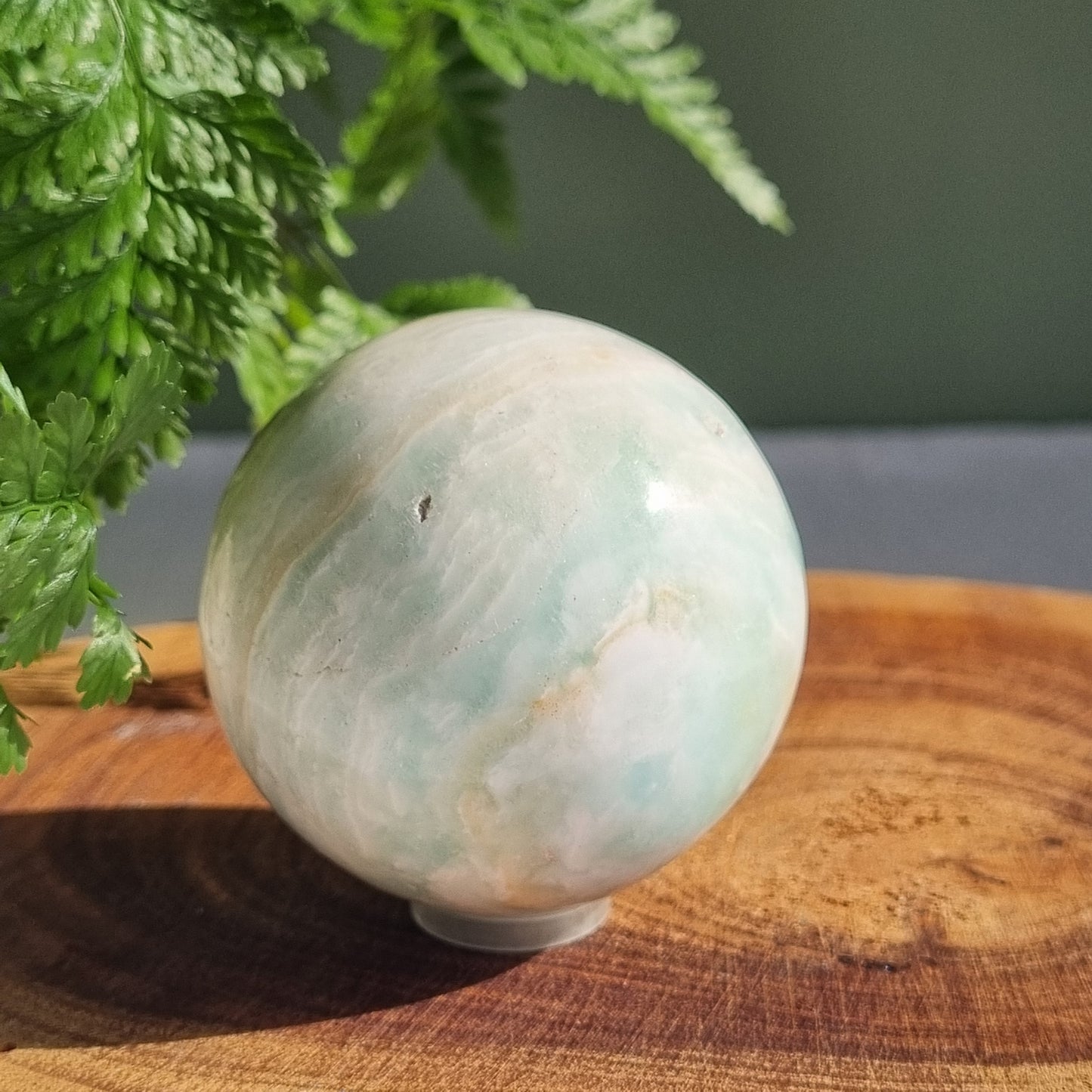 Caribbean Calcite Sphere - Pakistan - 215g