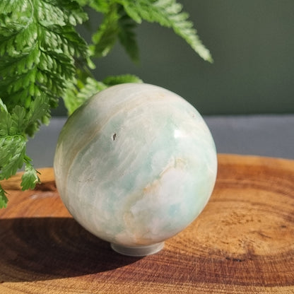 Caribbean Calcite Sphere - Pakistan - 215g