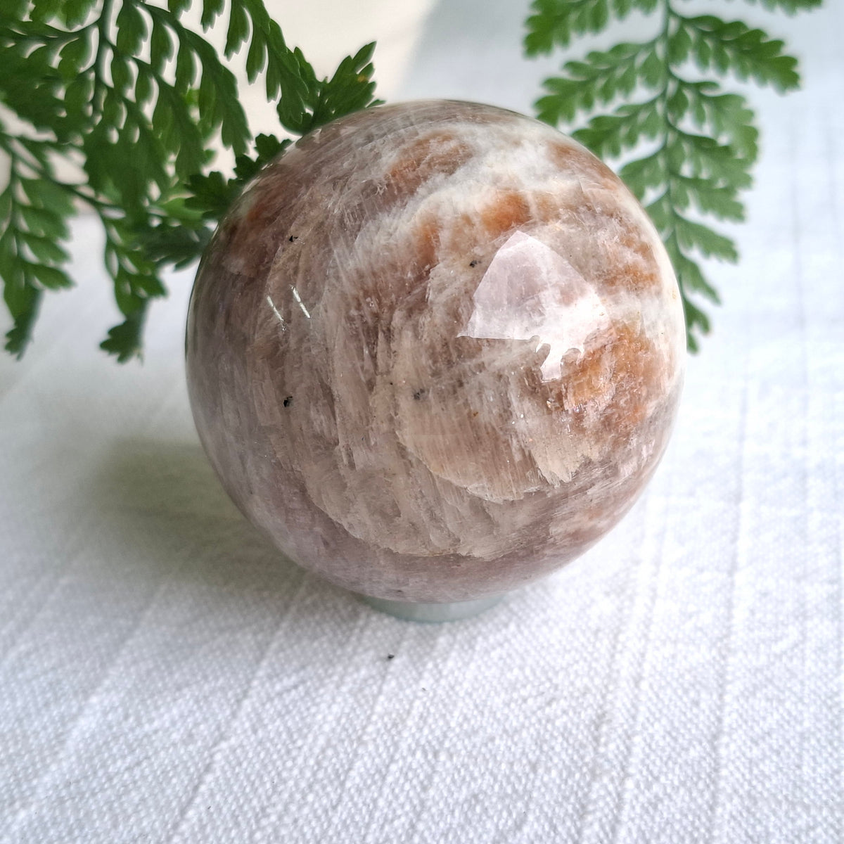 Black Moonstone with Sunstone Sphere - 129 grams